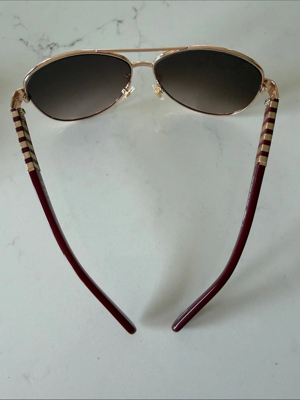 kate spade Rose Gold Frame Sunglasses with Burgundy Temples